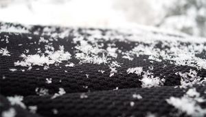 Preview wallpaper snow, surface, flakes, black, white