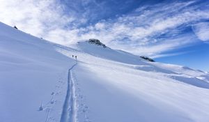 Preview wallpaper snow, trace, skiers, silhouettes, slope, mountain