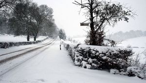 Preview wallpaper snow, winter, park, road, fence