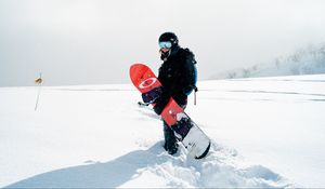 Preview wallpaper snowboard, girl, snow, snowboarder, board, sports equipment, winter, winter sports