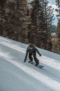 Preview wallpaper snowboarder, snowboard, helmet, slope, snow