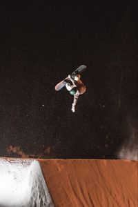 Preview wallpaper snowboarder, snowboard, helmet, slope, jump