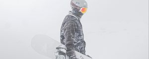 Preview wallpaper snowboarder, snowboard, snow, blizzard, man