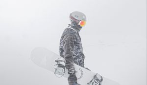 Preview wallpaper snowboarder, snowboard, snow, blizzard, man