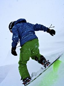 Preview wallpaper snowboarder, snowboard, snowfall, winter