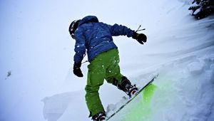 Preview wallpaper snowboarder, snowboard, snowfall, winter