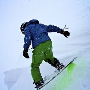 Preview wallpaper snowboarder, snowboard, snowfall, winter