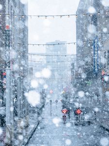 Preview wallpaper snowfall, snow, street, city, winter