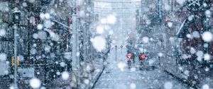 Preview wallpaper snowfall, snow, street, city, winter