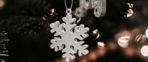 Preview wallpaper snowflake, christmas, new year, decoration, blur, tree toy