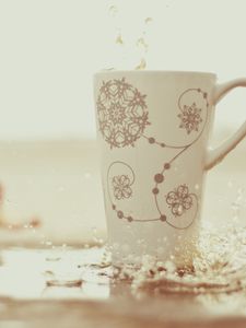 Preview wallpaper snowflakes, spray, cup, drop, water, motion blur