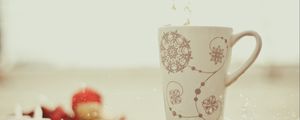 Preview wallpaper snowflakes, spray, cup, drop, water, motion blur