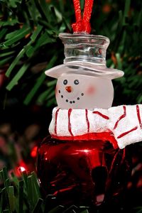 Preview wallpaper snowman, christmas decorations, branch, tree