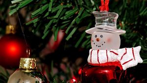 Preview wallpaper snowman, christmas decorations, branch, tree