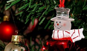 Preview wallpaper snowman, christmas decorations, branch, tree