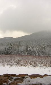 Preview wallpaper snowman, winter, mountains, trees, fog, clouds