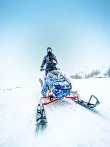 Preview wallpaper snowmobile, man, helmet, snow, winter