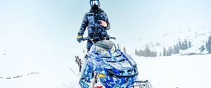 Preview wallpaper snowmobile, man, helmet, snow, winter