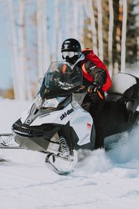 Preview wallpaper snowmobile, snow, helmet, winter