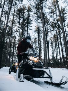 Preview wallpaper snowmobile, snow, winter, man, forest, nature