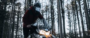 Preview wallpaper snowmobile, snow, winter, man, forest, nature