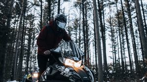 Preview wallpaper snowmobile, snow, winter, man, forest, nature