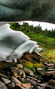 Preview wallpaper snowpack, river, stream, rocks, hills, nature