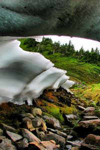 Preview wallpaper snowpack, river, stream, rocks, hills, nature