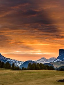 Preview wallpaper snowy mountains, sunset, grass, sky