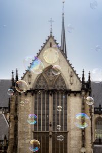 Preview wallpaper soap bubbles, building, towers, blur