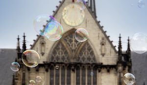 Preview wallpaper soap bubbles, building, towers, blur