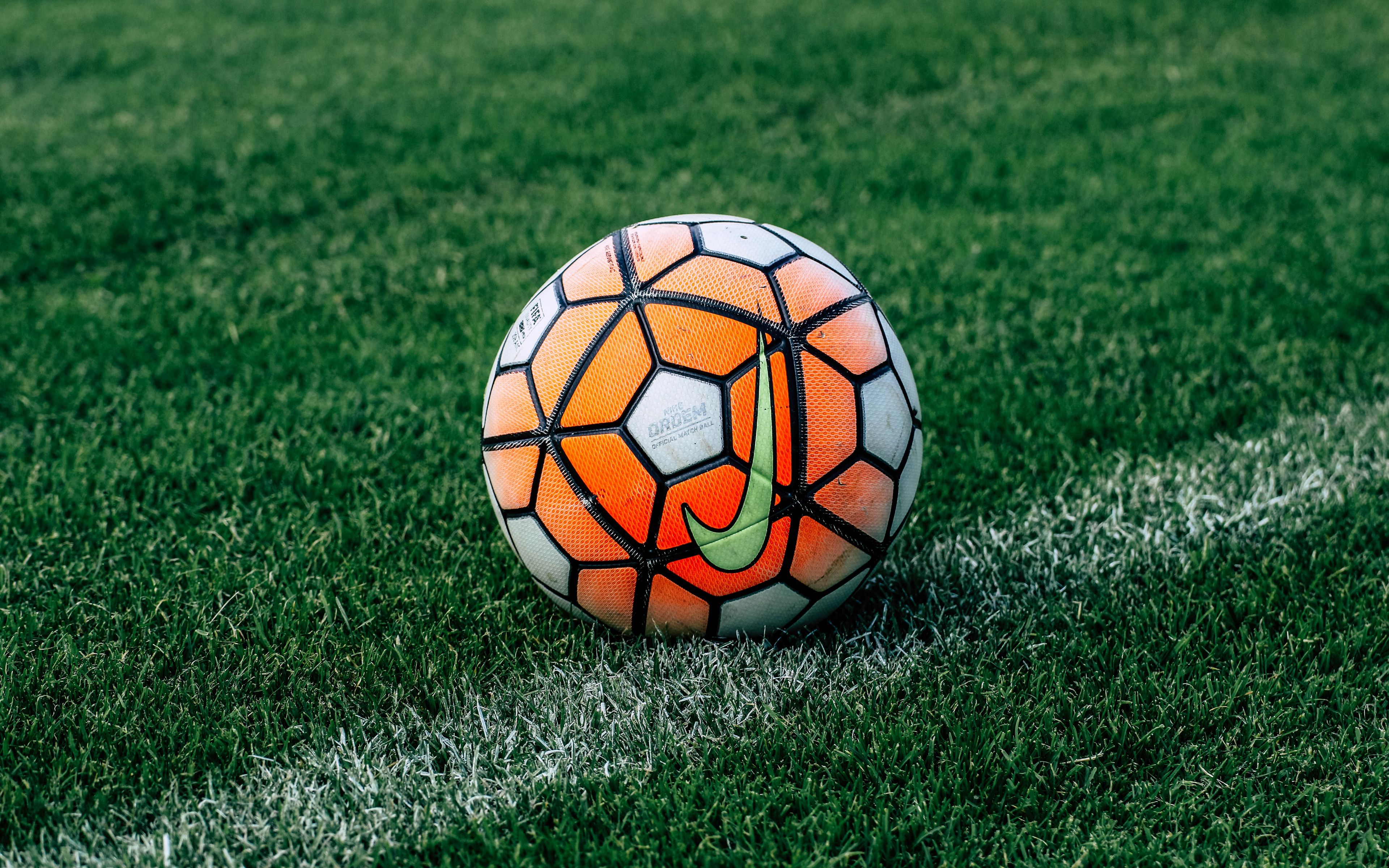 Download wallpaper 3840x2400 soccer ball, football, lawn, grass 4k