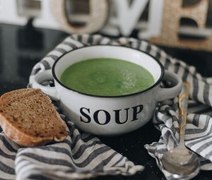 Preview wallpaper soup, bowl, spoon, bread