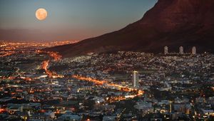 Preview wallpaper south africa, cape town, metropolis, skyscrapers, houses, light, lights, dusk, sky, moon, mountain, view, elevation