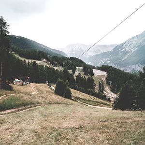 Preview wallpaper southern alps, mountains, trees, building