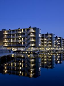 Preview wallpaper spain, buildings, sea, building, evening