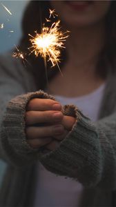 Preview wallpaper sparkler, girl, hands