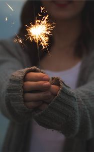 Preview wallpaper sparkler, girl, hands