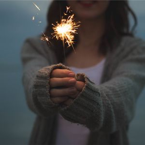 Preview wallpaper sparkler, girl, hands