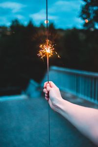 Preview wallpaper sparkler, hand, sparks, focus