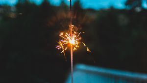 Preview wallpaper sparkler, hand, sparks, focus