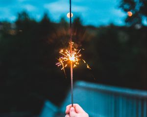 Preview wallpaper sparkler, hand, sparks, focus