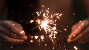 Preview wallpaper sparkler, spark, hands, shine, light