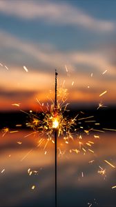 Preview wallpaper sparkler, sparks, blur, sunset