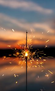 Preview wallpaper sparkler, sparks, blur, sunset