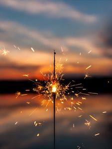 Preview wallpaper sparkler, sparks, blur, sunset