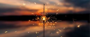 Preview wallpaper sparkler, sparks, blur, sunset