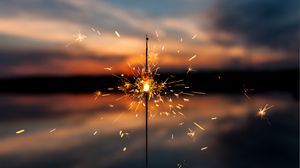 Preview wallpaper sparkler, sparks, blur, sunset