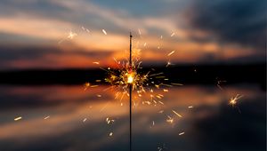 Preview wallpaper sparkler, sparks, blur, sunset