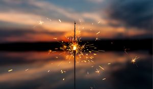 Preview wallpaper sparkler, sparks, blur, sunset